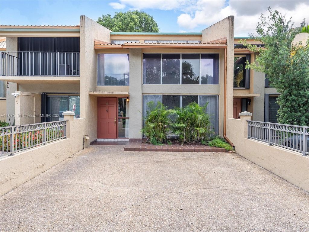 Photo of 720 E Coco Plum Cir #6, Plantation, FL 33324 (MLS # A11630101)