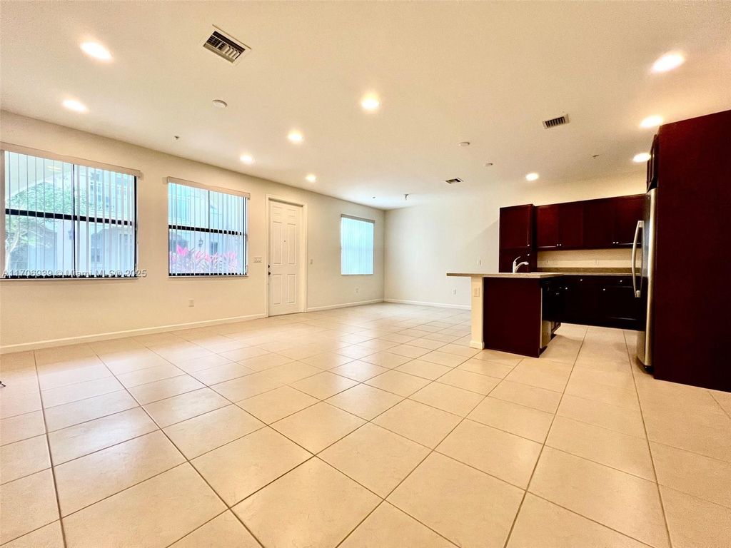 Photo of 12585 NW 32nd Mnr, Sunrise, FL 33323 (MLS # A11706939)