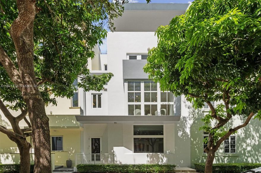 Rarely available within Aqua, Miami Beach’s premier private gated island community, this expansive 3,771 SF, 4 bed, 4.5 bath townhome is bathed in natural light with tranquil garden vistas. Interiors feature a Bulthaup kitchen with Sub-Zero, Thermador & Gaggenau appliances, Carrara marble baths, Dornbracht fixtures, custom closets, and dedicated den & office space. Offering the privacy of a single-family home with the amenities of a luxury condominium, residents enjoy 24-hour security, doorman, valet, private 2-car garage, two pools, jacuzzi's, fitness center & spa, pilates, club room, party room and walking paths. A rare opportunity to experience elegance, comfort, and effortless island living.
