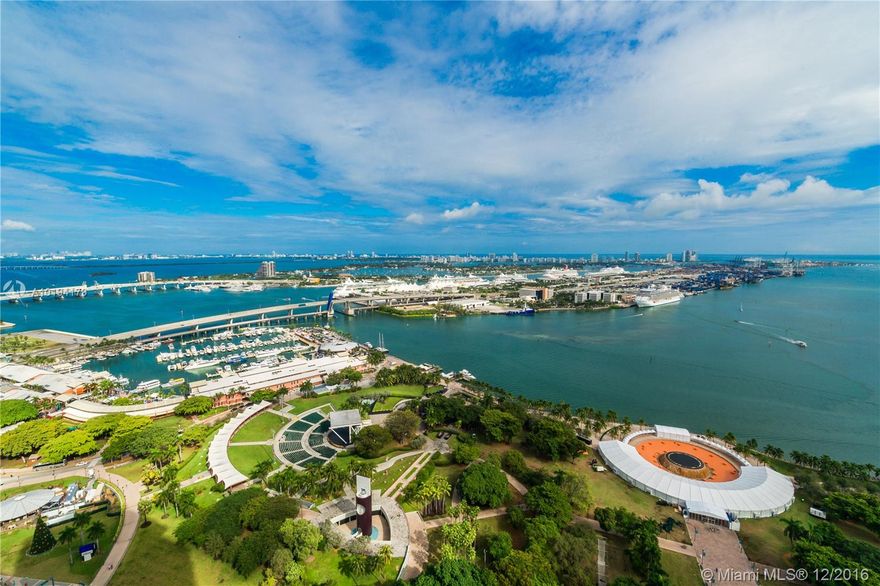 BEST PRICED UNIT WITH THE MOST DESIRABLE EAST FACING VIEW AND LAYOUT IN THE BUILDING!! 2 BED, 2 BATH+DEN THAT CAN EASILY BE CONVERTED TO 3RD BED. OVERSIZED BALCONY THAT OPENS UP TO STUNNING DIRECT WATER VIEW OF BISCAYNE BAY, SOUTH BEACH AND THE ATLANTIC OCEAN. UPDATED WITH PORCELIN TILE, OVERSIZED CALIFORNIA CLOSETS AND ZWAVE REMOTE BLINDS. 5 STAR AMENITIES INCLUDE SPECTACULAR SKYLOBBY, OLYMPIC SIZE POOL, CABANAS, CLUBROOM, SPA, STATE OF THE ART FITNESS CENTER, 24 HOUR CONCIERGE VALET PARKING. A TRUE 10!