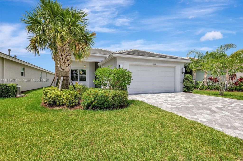 Photo of 13349 SW Ibis Shores Rd, Port St Lucie, FL 34987 (MLS # A11812584)