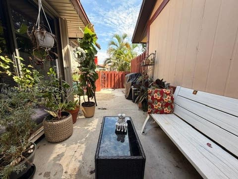 Photo of 9631 W Elm Ln, Miramar, FL 33025 (MLS # A12065421)