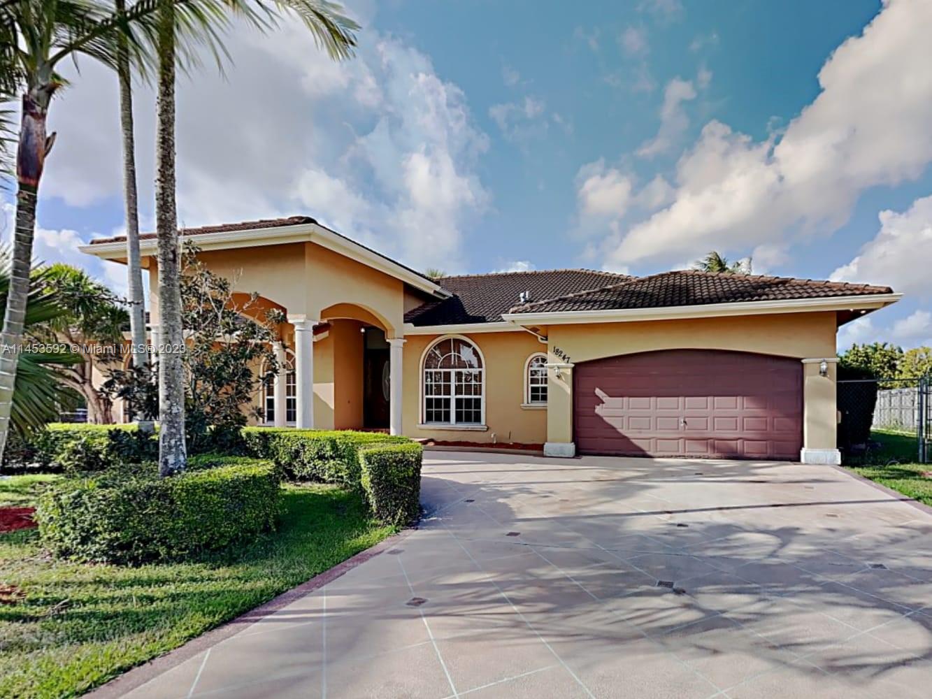 You will love making this beautiful house your new home! The front exterior boasts a two-car garage, a covered entrance and charming curb appeal. The interior is lined with wood-style tile flooring and each room offers plenty of space for making long-lasting memories. Cook meals in the kitchen with stainless steel appliances, beautiful wood cabinetry, granite countertops and a breakfast bar. You'll love spending time in the bedrooms with nice windows, base molding and plenty of space to relax. The bathroom has a tub, glass-door shower and dual sinks. The backyard offers lots of outdoor space, a covered patio area for your morning coffee, a stunning in-ground pool for weekend entertaining and a privacy fence so you can enjoy your own outdoor oasis.