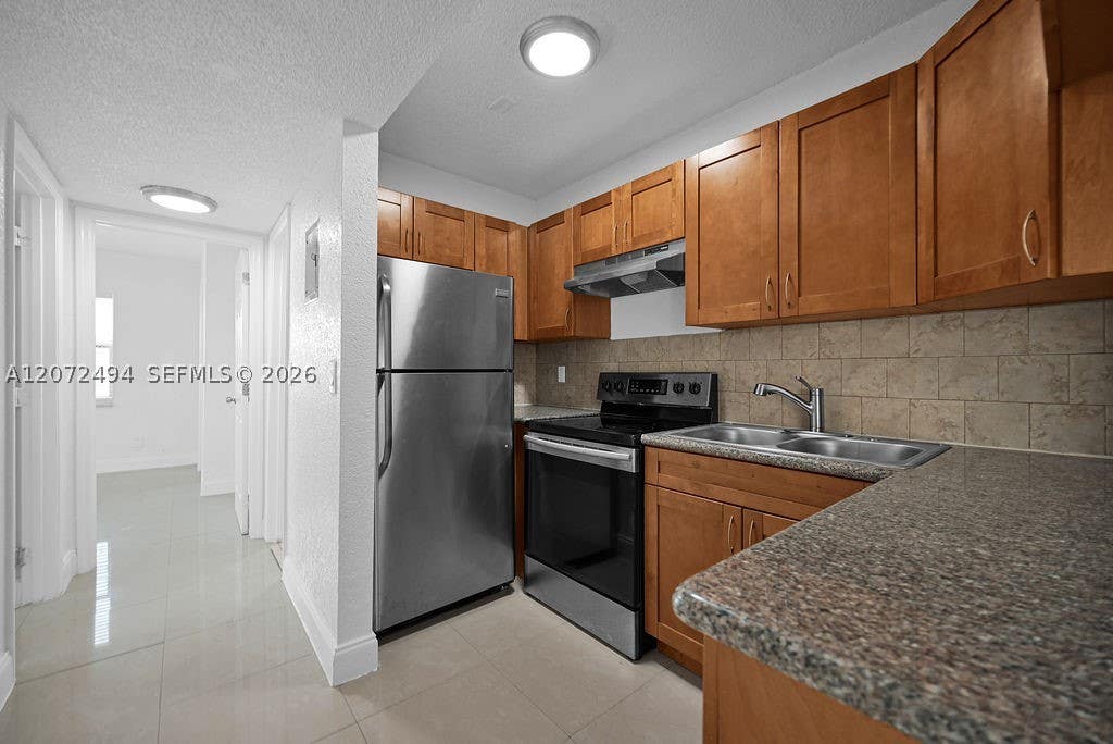 Photo of 622 Kathy Ct, Margate, FL 33068 (MLS # A12072494)