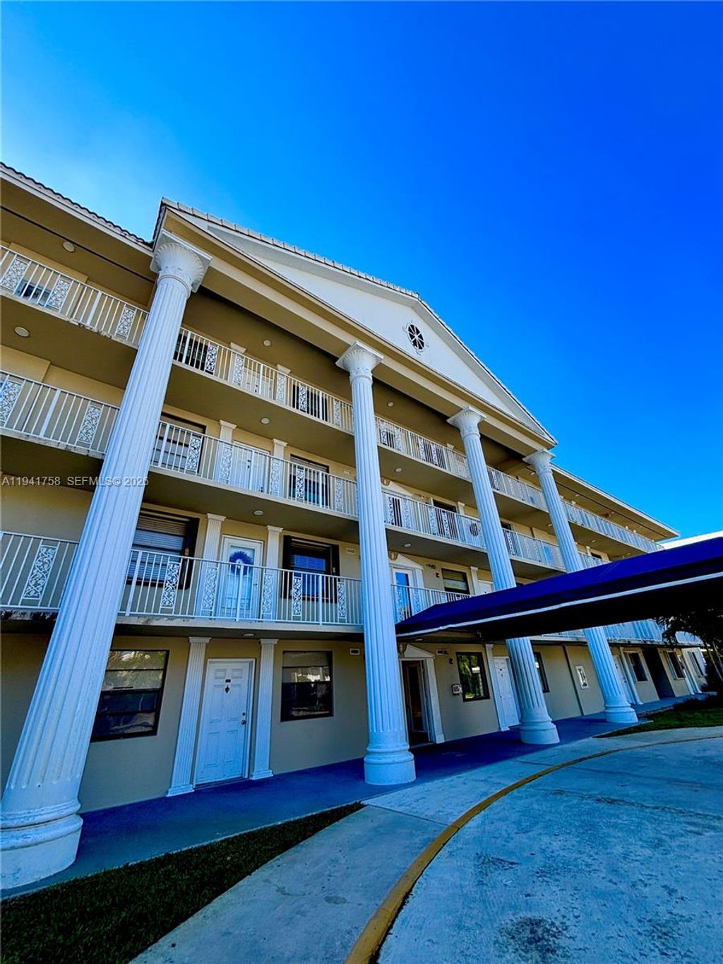 Photo of 3511 Village Blvd #205, West Palm Beach, FL 33409 (MLS # A11941758)