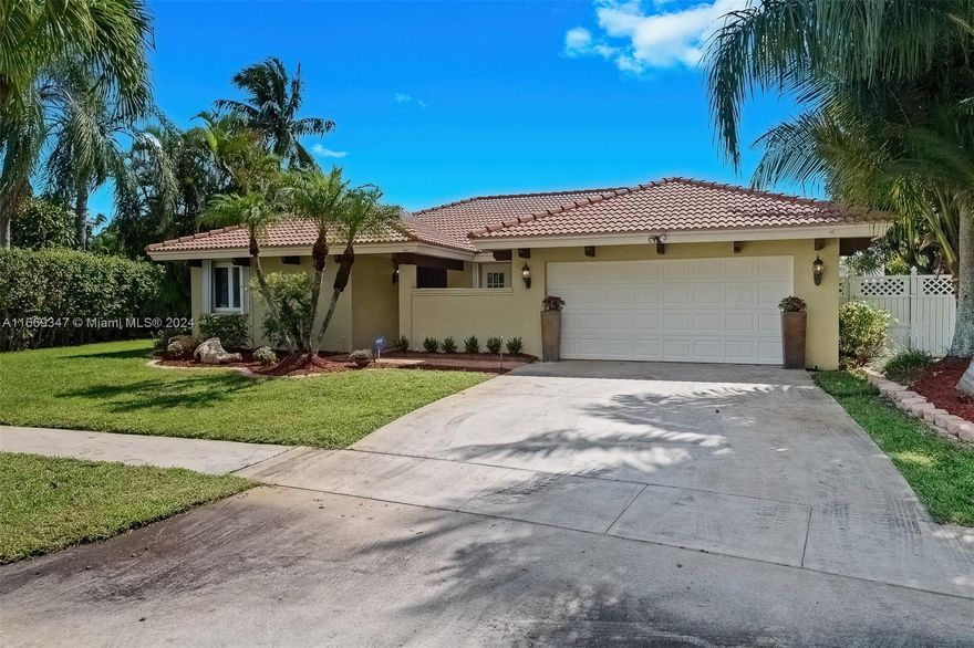 3 BEDROOMS, 2 FULL BATHS IN BOCA RATON, CLOSE TO EVERYTHING.  CANAL FRONT SCREENED PATIO WITH POOL, INSIDE LAUNDRY ROOM & ATTACHED 2-CAR GARAGE.  THE HOMEOWNER'S FEE IS $500 PER YEAR, ENJOY THE PARK WITH BBQ, TENNIS/PICKLE BALL COURTS & THE PLAYGROUND.  OPEN FLOORPLAN YET DEFINED LIVING ROOM, DINING ROOM & FAMILY ROOM.  THE KITCHEN IS OPEN TO THE FAMILY ROOM & HAS WOOD CABINETS, STAINLESS STEEL APPLIANCES & GRANITE COUNTERTOPS.  GREAT STORAGE & COUNTERTOP SPACE IN THE KITCHEN WITH EXTRA STORAGE IN THE LAUNDRY ROOM/PANTRY.  THE PRIMARY BEDROOM HAS GOOD CLOSET SPACE & ACCESS TO THE POOL.  THIS HOME HAS A NEW CENTRAL A/C & WATER HEATER.  HURRICANE SHUTTERS FOR ALL WINDOWS AND DOORS.  MINUTES FROM FRESH MARKET, WHOLE FOODS, TRADER JOES, TRI-RAIL STATION & OTHER GREAT SHOPPING.  A RATED SCHOOLS