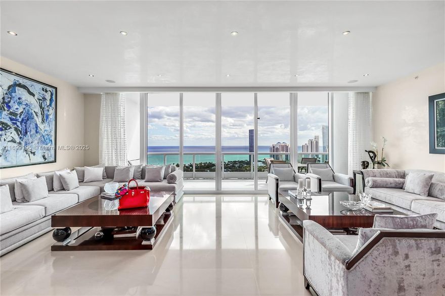 Porto Vita: Luxury and comfort combined to create a lifestyle you won’t want to give up. This gorgeous and roomy property is one of the top picks in the complex, with beautiful marble floors and floor-to-ceiling windows from the 29th floor that let in tons of natural light and offer amazing views. 
Two primary ensuite bathrooms, flow-through views, and more closet space than you’ll know what to do with are included.
Porto Vita is all about service, making you feel at home when you arrive. You’ll enjoy 24/7 security and fun amenities like tennis courts, great restaurants, a cool bar, and sports facilities for pickleball, soccer, and basketball. Plus, there’s a lounge just for the kids!