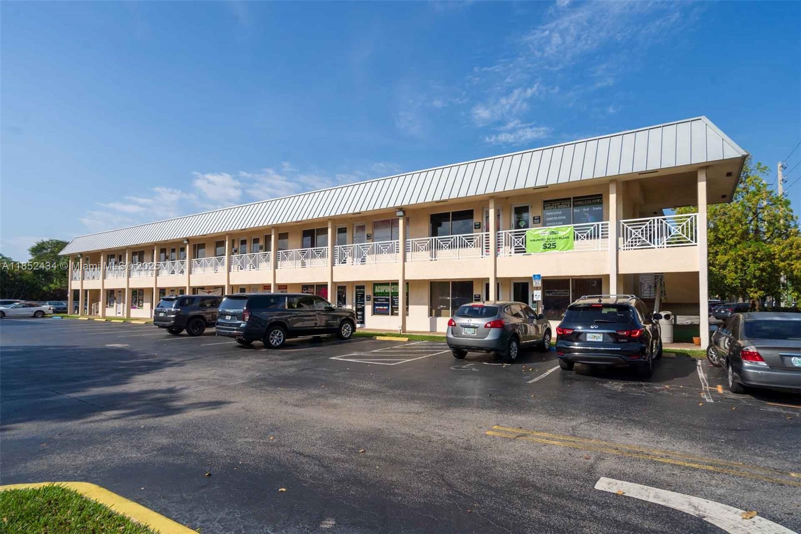 Corner unit, large space with natural light. The plaza has ample parking.