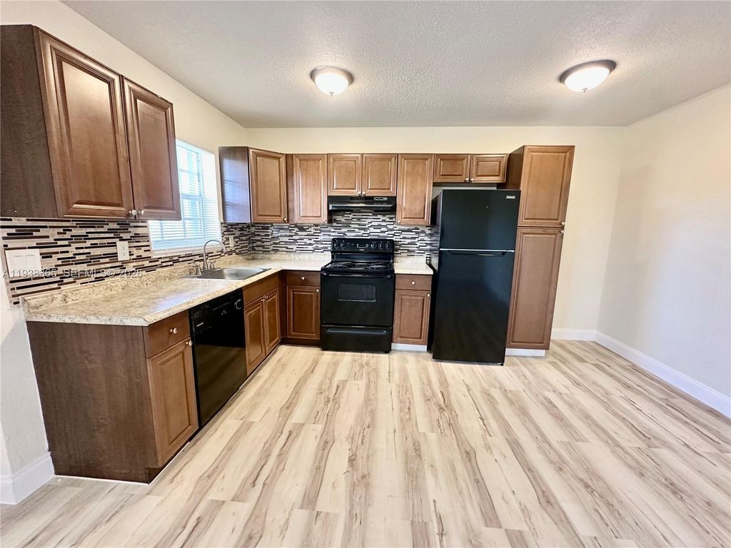 Photo of 5420 NE 22nd Ter #18, Fort Lauderdale, FL 33308 (MLS # A11938365)