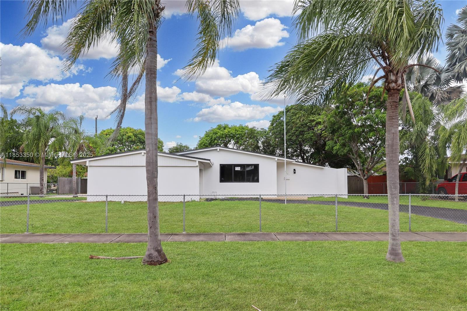 Experience the highly desirable lifestyle of Palmetto Country Club Estates in this newly renovated three-bedroom, two-bathroom residence. Step inside to a spacious, newly floored layout that blends comfort with easy maintenance. The entire home has been updated, including a new kitchen and bathrooms, a new A/C unit, and a new roof. For peace of mind and energy efficiency, the home is also equipped with impact windows and doors. The one-car garage can be accessed from either side of the circular driveway. Outside, a generous patio area is perfect for entertaining or relaxing and provides ample space for a canopy or gazebo. This home's prime location offers convenient access to top-rated schools, diverse shopping and dining, and the recreational opportunities at Black Point Marina.
