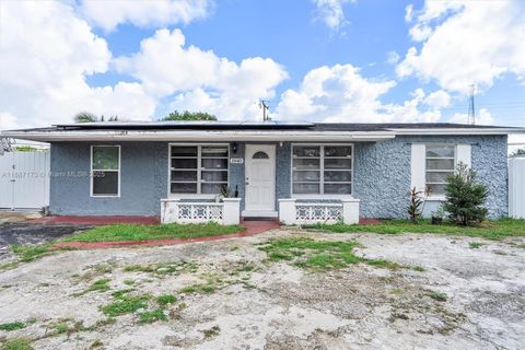 Photo of 1840 NW 33rd Ter, Lauderhill, FL 33311 (MLS # A11887173)