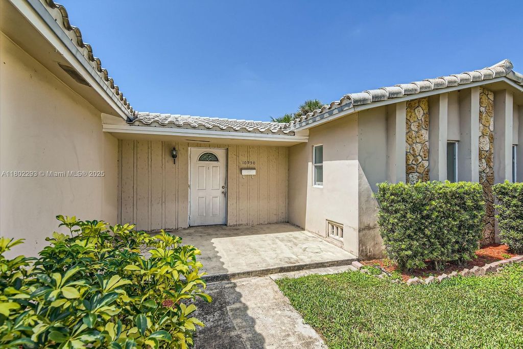 Photo of 10950 NW 38th Ct, Coral Springs, FL 33065 (MLS # A11802293)