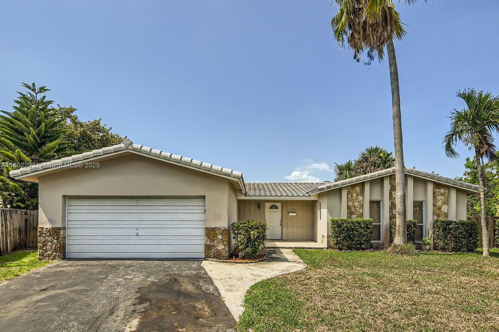 Photo of 10950 NW 38th Ct, Coral Springs, FL 33065 (MLS # A11802293)
