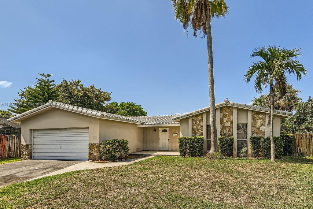 Photo of 10950 NW 38th Ct, Coral Springs, FL 33065 (MLS # A11802293)
