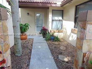 Enter through a beautiful impact glass door into this timeless, classic, and contemporary patio home, perfect for anyone who likes to entertain outdoors, rain or shine! A desirable, sought-after floor plan surrounds the 500 sqft covered & enclosed patio, which is the heart of this home. Neutral 20x20 throughout, Vaulted ceilings, Recessed lighting, Open and spacious Dining & Living rooms, Open kitchen overlooks the family room and features Galaxy granite counters, 42" raised clear wood maple kitchen cabinets, island w/seating, & stainless steel appliances: split bedroom plan, large Master, custom walk-in closet, and bath w/Kholer two-person jacuzzi tub. Home is nestled in a private location on a peaceful, greenbelt lot and is fenced for added privacy, also features accordion shutters.