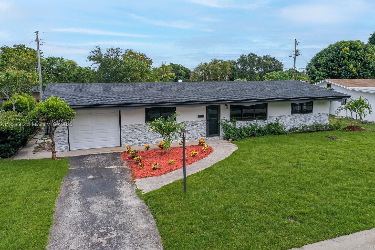 Fully renovated 3-bedroom, 2-bathroom single-family home in the heart of Plantation. Every inch has been thoughtfully updated from the brand-new kitchen, soft-close cabinetry, and stainless steel appliances to the elegant bathrooms with contemporary finishes. Enjoy light-filled living spaces throughout, impact windows, and a newly installed roof. NO HOA, this turnkey home is conveniently located near schools, shopping, parks, and major highways.