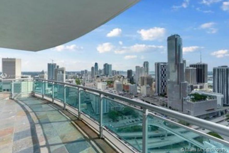 Amazing views of downtown Miami, 3 bed 2 bath. 3rd Bedroom is a converted Den. Porcelain and wood floors. Modern kitchen SS appliances and granite counter tops. Oversized balcony. Master bath with double sinks, large walk in closet, washer & dryer in unit. One parking space. WIND BY NEO Built in 2008, Full-Service Bldg: 24hr Security, Concierge, Valet Park, Business Center, Swimming Pool, Fitness Ctr-Gym, Racquetball Court, Sauna-Spa, Party Room, Child Play Room, Theater. Walk to Downtown, Shops, Nightlife & Restaurants. NO pets, association doesn't allow pets. Tenant occupied until 09/01/2019. EASY TO SHOW!