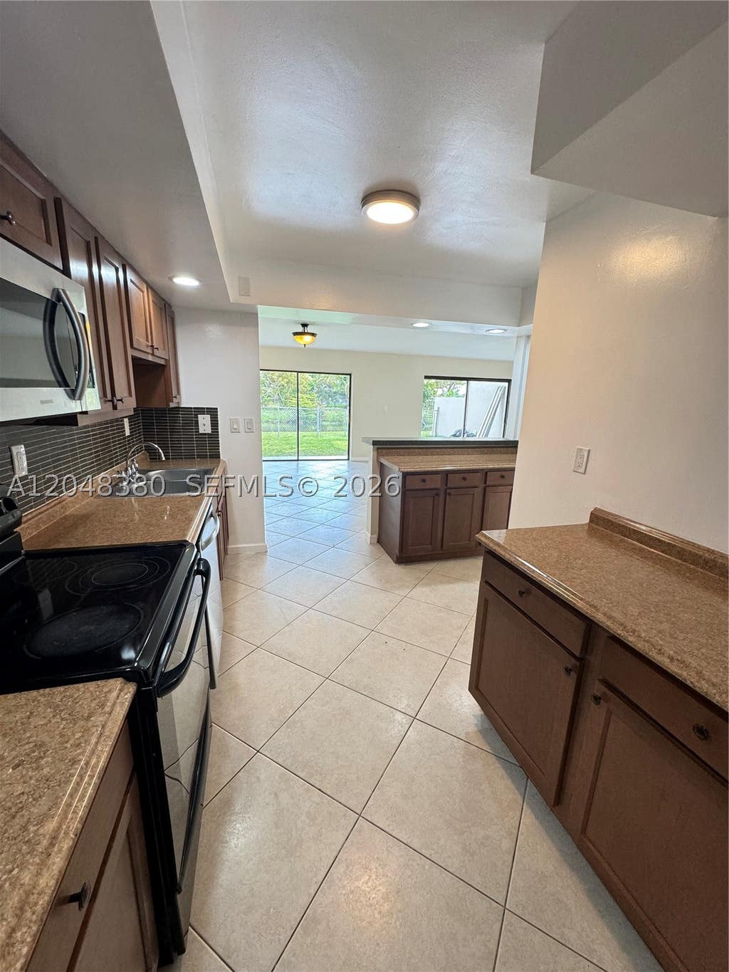 Photo of 3167 Coral Springs Dr #123, Coral Springs, FL 33065 (MLS # A12048380)