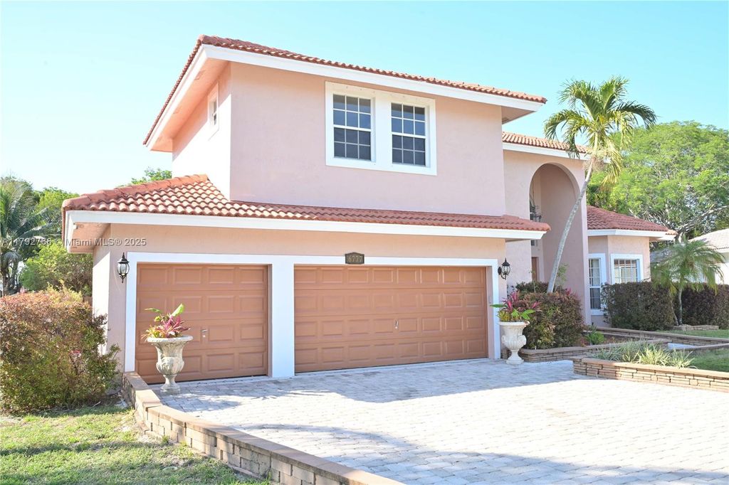 Photo of 6777 NW 44th Ct, Coral Springs, FL 33067 (MLS # A11792766)