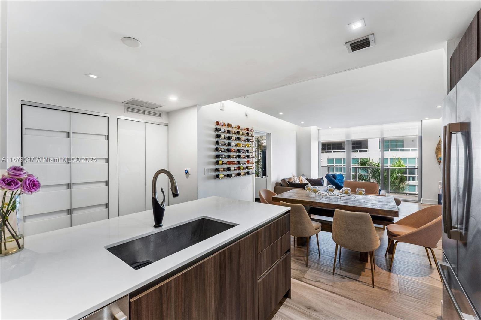 Spacious 2-bedroom plus enclosed den residence at Aria on the Bay. The den includes a Murphy bed and can serve as a home office or an additional bedroom with its own full bathroom. Located on the 4th floor, this furnished unit enjoys peaceful views of the park and Biscayne Bay and features an oversized balcony, ceramic flooring, mini bar with wine cooler, upgraded lighting, and private elevator entry. Assigned parking is located on the same floor just steps away, with the option to lease a second parking space either assigned or valet. Aria on the Bay offers resort-style amenities and 24-hour security, with two pools, fitness center, spa, lounge, kids’ playroom and more, all in the vibrant Edgewater neighborhood steps from the Arts & Entertainment District.