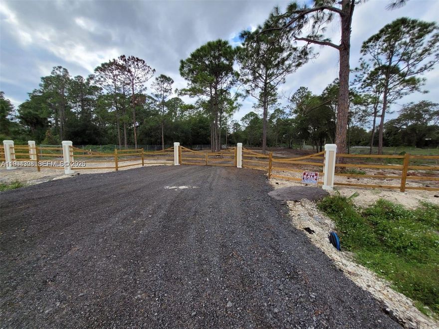 Secure your slice of paradise on this 1.25-acre corner lot in the sought-after Montura Ranches. This lot boasts
paved road access and canal frontage—ideal for those seeking ample space, nature, and a slower pace of life. Lot
completely cleared and fenced w/ brand new chain-link fence on both sides and rear; a spectacular ranch-type
fence and entrance gate complete w/ concrete columns, wood posts and railings. Very large culvert-driveway
access from an asphalt road. Plot has been refilled, compacted, and prepared for immediate construction. All
construction and improvements thus far have been completed with proper permitting. Unrestricted parking.
