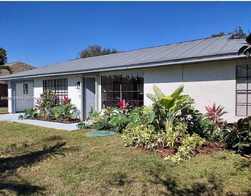 Welcome to this well-maintained 3-bedroom, 2-bathroom single-family home located at 841 NW Riverside Dr in beautiful Port Saint Lucie. This inviting residence offers a comfortable and functional layout, perfect for family to enjoy with a spacious backyard for relaxation or entertainment. The home offers a split floor plan with a private bathroom for the primary suite and one bathroom for the two bedrooms located across the living space. Conveniently located close to I-95 and the Florida Turnpike, this home offers easy commuting and quick access to shopping, dining, schools, parks, and everything Port Saint Lucie has to offer. Situated in a quiet residential neighborhood, it also provides the comfort of peaceful living with city conveniences nearby. Schedule your showing today.