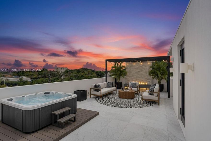 Priced $150,000 under appraised value! DEVELOPER CLOSE-OUT! Discover The Bennet, a boutique collection of 15 brand new never occupied townhomes set in the heart of Miami’s iconic MiMo District. Enter your x-large 2 car garage & enter your over 2200 TSFT 3 BR, 3 full bath corner unit with soaring 12ft ceilings & filled with natural light pouring in. Italian inspired luxury quality exodes with wood-like porcelain tile floors, quartz counters, marble backsplash and accents in all baths. Soundproof impact glass, SS appliances, choose from 3 balconies where you wish to see the sunrise & sunsets! The Bennet isn’t just a residence—it’s a statement of style, luxury, & modern elegance. Surrounded by world-class dining, boutique shopping, & the city’s creative energy. VERY LOW HOA FEES, less than $700 / month!! Please ask us about the 3-2-1 approved lender buydown. Meaning you get an interest rate as low as 3% with a monthly payment probably lower that what you're paying in rent!! Unpack & enjoy... On Zillow, scroll down to "facts & features", click on "show more", then click "View virtual tour" for your Virtual Interactive Lifestyle Concierge! Ask anything. Explore everything.