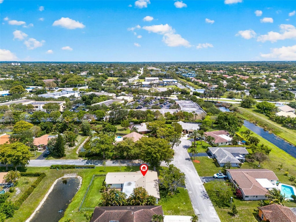 Photo of 1980 NW 81st Ave, Coral Springs, FL 33071 (MLS # A12018209)
