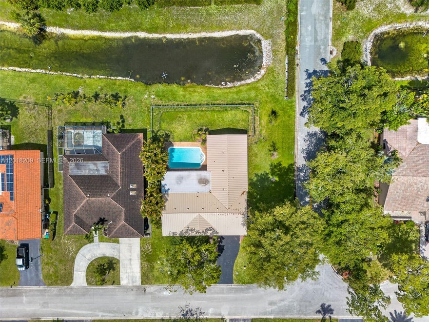 The opportunity you’ve been waiting for has finally arrived!
Now featuring a BRAND-NEW METAL ROOF, this spacious 5-bedroom /3 bathrooms pool home offers the perfect combination of beauty, protection, and long-term value.
Located in one of the most desirable neighborhoods in Coral Springs, this exceptional property sits on a premium corner lot with tranquil canal views.
Enjoy a bright, sun-filled kitchen complete with brand-new stainless steel appliances and beautiful views of the garden and sparkling pool area. Home features include, impact windows, spacious covered porch, beautiful brick façade and 2-car garage.
Don’t miss your chance to own this incredible Coral Springs property. Schedule your private showing today!