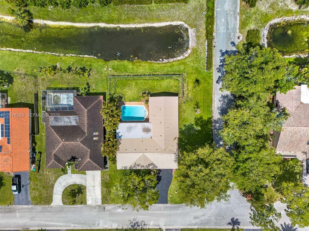 Photo of 1980 NW 81st Ave, Coral Springs, FL 33071 (MLS # A12018209)