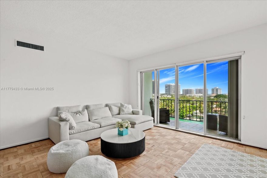 Priced to sell! Unit being sold with Furniture. Tired of Noisy Neighbors? We Have Concrete Walls! Tranquility at its Best. Lowest price waterfront 2/Bed on the island per Sq.Ft. with direct water views. Unobstructed direct 180- degree views of the bay, canal, and city along with a peek of the Atlantic Ocean from this PH corner unit with two oversized in-suite bedrooms w/walk-in closets and 2.5 bathrooms. This 1,640 ft. unit features a unique blend of modern & traditional styles with immaculate original wood floors throughout, 10' ceilings, a European eat-in kitchen, a newer A/C unit, and plenty of natural light. Sitting right on the Indian Creek canal, this boutique building offers a waterfront pool, only 4 units per floor, and assigned parking.