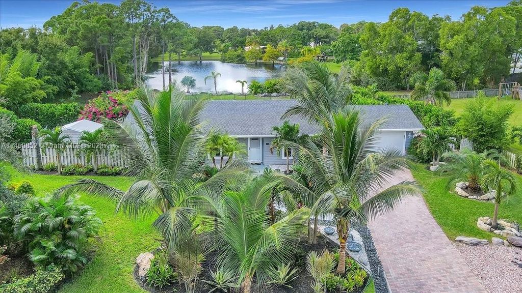 Photo of 5564 SE Martin Meadows Ave, Stuart, FL 34997 (MLS # A11458852)