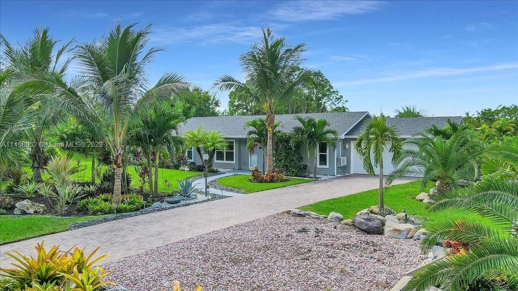 Photo of 5564 SE Martin Meadows Ave, Stuart, FL 34997 (MLS # A11458852)