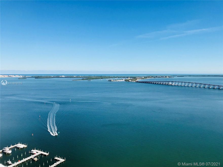 Stunning Tower residence at Santa Maria w/breathtaking sweeping views of the ocean to the east and dramatic city views to the west. This custom designed apt. features superb millwork and built-ins w/state of the art audio and video systems throughout. Entertaining flows easily in the living room w/an inviting marble and onyx bar and full size wine cooler. Hand carved marble columns, 36x36 marble floors, motorized shades are some of the features this impeccable residence has to offer. Deluxe master, ensuite bedrooms and exquisite marble baths, huge balconies, private elevator foyer and 4 car parking. An additional 346 sf storage is included.