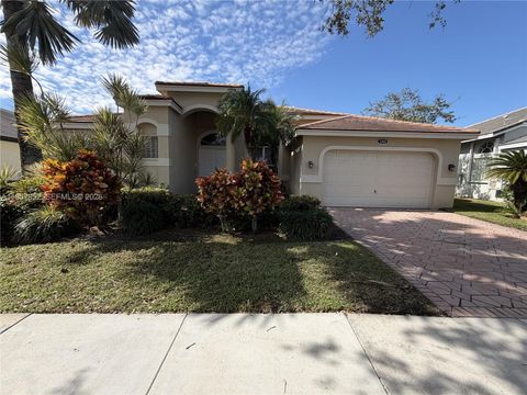 Photo of 1260 Ginger Cir, Weston, FL 33326 (MLS # A11957952)