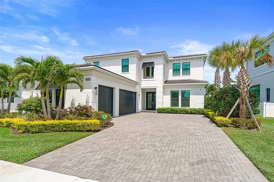 Experience luxurious lakefront living in this expansive 5BR/5BA home, perfectly situated on a premium lot in one of Northern Palm Beach’s most desirable gated communities. Built in 2022, this residence features a chef’s kitchen with upgraded cabinetry, Monogram/Café appliances, two dining areas, and a spacious great room ideal for entertaining. The first floor offers two bedrooms, including a serene primary suite with views of the private saltwater pool, spa, & lake. Upstairs includes three ensuite bedrooms and a large loft, perfect for a second living space. Enjoy 24/7 security, a resort-style pool, clubhouse, & fitness center, all just minutes from top-rated schools, world-class golf courses, shopping, dining, and beaches. Easy access to highways and PBI Airport adds convenience.