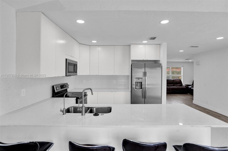 Get ready to own a home with a NEW ROOF, NEW AC, NEW water heater, NEW electrical panel, NEW hurricane impact front door, and NEW hurricane impact side door. All installed in 2021! Accordion shutters on all windows except for the two front windows. Quartz countertops, stainless steel appliances, and new interior paint. Large fenced-in back and front yard, one car garage.