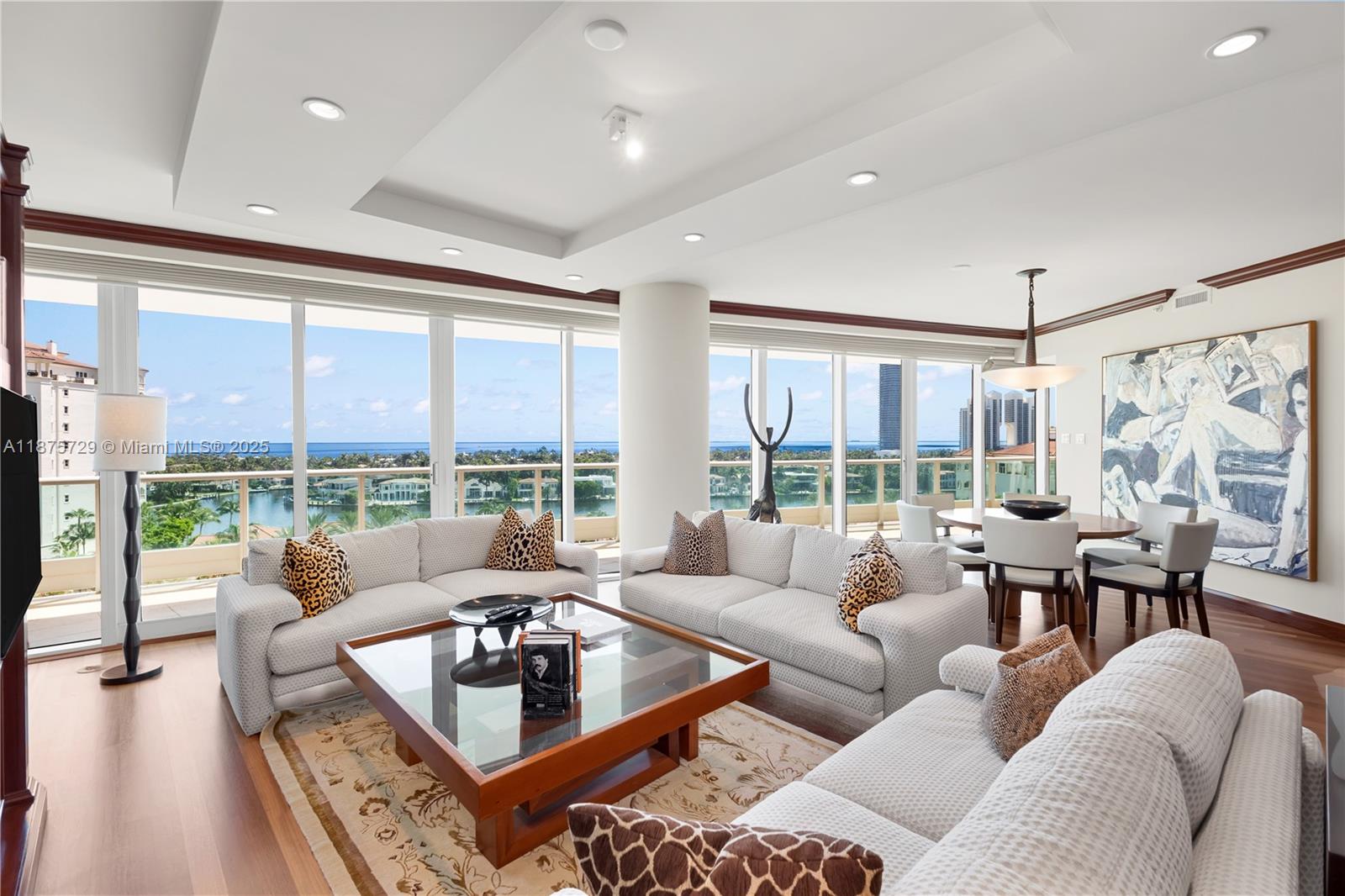 Stunning and meticulous, this unit offers sweeping views of the Atlantic Ocean, Intracoastal, and Golden Beach. Views with Personality lead the way to a split floor plan—beautiful built-ins in the living room and dining room areas. The oversized terraces are like having a second living room outdoors. This unit has been finished with the chicest of tastes. Wood floors throughout make for a timeless design. Living in this beautiful home wouldn't be complete without the amenities Porto Vita has become famous for. You never hear a NO. Whatever your desires are, you are looked after and taken care of. Tennis, Pickleball, swim classes, and a world-class restaurant are just some of the perks of living here.