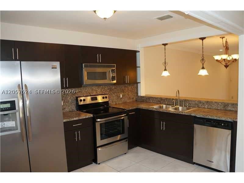 Photo of 459 Lakeview Dr #2, Weston, FL 33326 (MLS # A12057524)