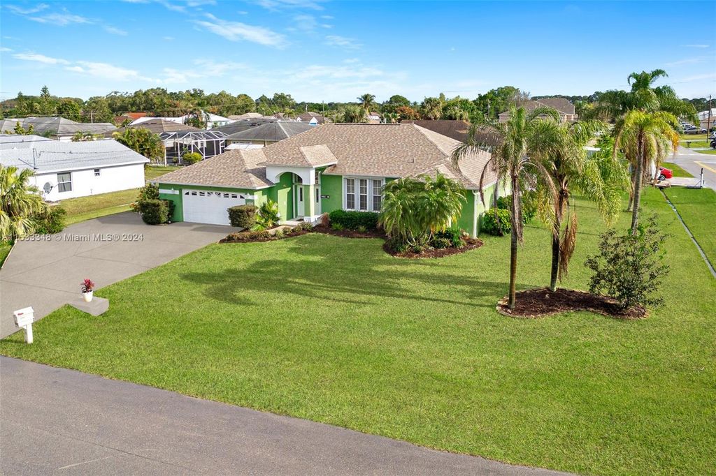 Photo of 5695 NW Delmar Ave, Port Saint Lucie, FL 34983 (MLS # A11533348)