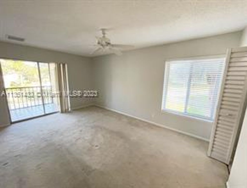 Photo of 6404 Chasewood Dr #D, Jupiter, FL 33458 (MLS # A11351432)