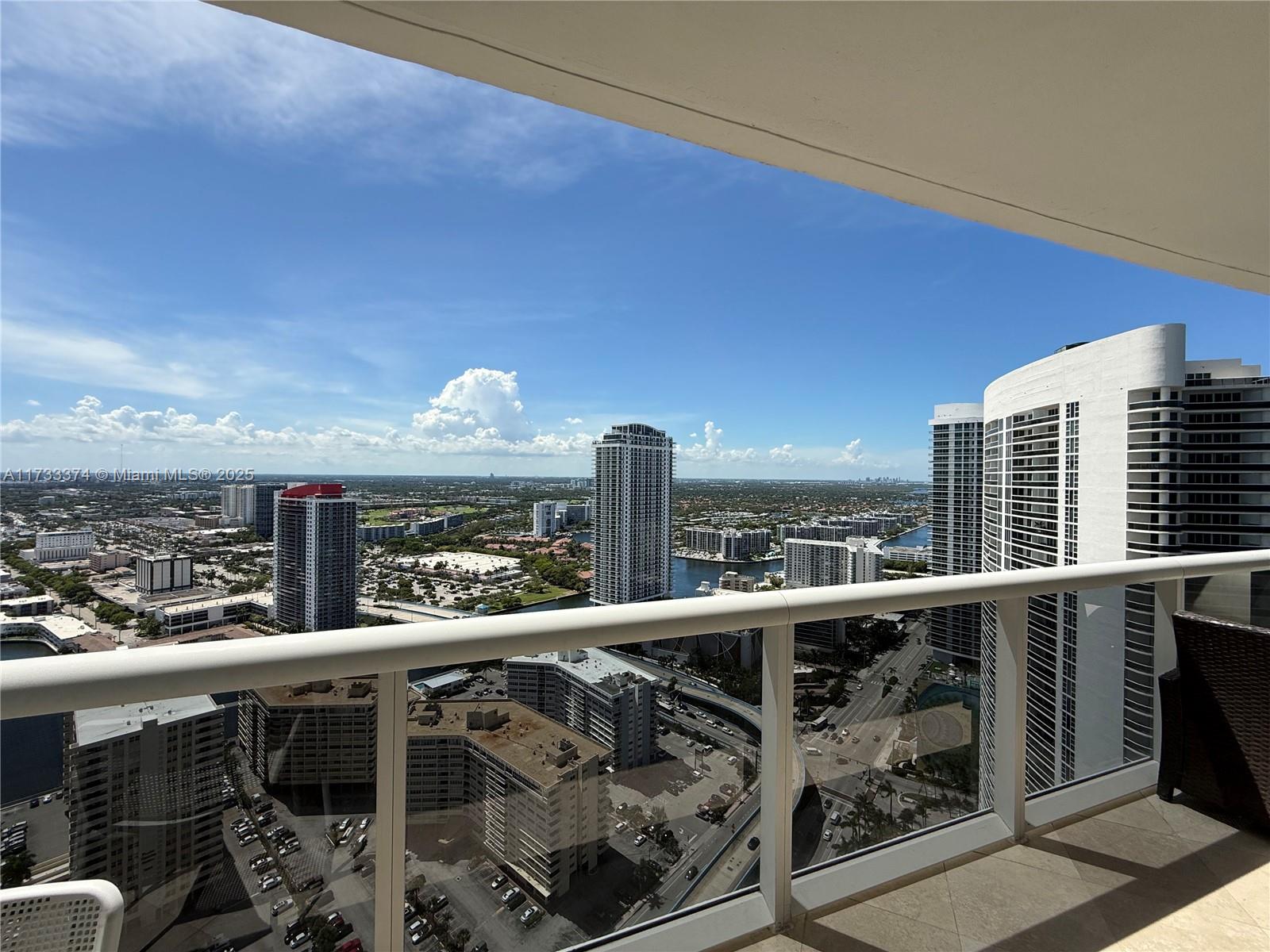 Breathtaking intracoastal and city views await you from this spacious 1-bedroom + den, 1-bath unit, offering 1,086 sq. ft. of living space and an expansive 195 sq. ft. balcony. located in a prestigious 5-star oceanfront complex, the building boasts a 40,000 sq. ft. full-service spa and fitness center, a restaurant, and a bar with poolside service. set on a stunning 9-acre property with 810 feet of ocean frontage, residents enjoy full-time concierge services and 24-hour valet parking.