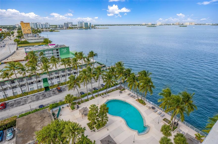 Breathtaking views and endless sunsets await in this spacious 1 bed / 1 bath residence offering 940 SF of light-filled living space. This bright home features tile flooring throughout, a large kitchen, and stunning views from every room. Enjoy both serene water vistas and the dazzling Downtown Miami skyline. The unit includes one assigned parking space. The building offers resort-style amenities, including a waterfront pool, fitness center, party room, and 24/7 attended lobby. Located in the heart of North Bay Village, a city undergoing major redevelopment and now home to the Argentine Football Association’s new training facility. Perfectly situated just minutes from Miami Beach, Bal Harbour, Edgewater, and the Design District. Don’t miss this opportunity to own your piece of paradise.