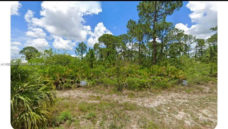 Excellent opportunity to build your dream home or investment property! This corner lot offers rear water views, electricity available in front, and paved road access right in front of the property. Enjoy the convenience of a well-located Don't miss this opportunity Located at 3418 71st ST  W Lehigh Acres Fl 33971
