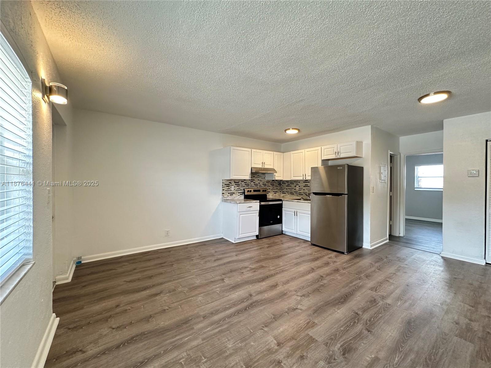 BRAND NEW, fully renovated 1st floor 1BD/1BA situated in a great pocket of Oakland Park! Central to everything yet tucked away in a quiet residential neighborhood. Apartment features new wood floors, new ss appliances, impact windows, central AC, new lighting, freshly painted walls and kitchen & bathroom upgrades. Water, waste, sewer, maintenance and pest control included in rent. 1 assigned parking space also included. Washer, dryer, and garden area on-site! Excellent neighborhood nearby great schools! So close to the beach, as well as major highways (Dixie, A1A, i95 etc), Recreation Center, parks, shops, restaurants & bars. Two-story family & pet friendly complex.. entire property was redone! Pets welcome with small 1x non-refundable pet deposit. 12 month lease min. Handicap Accessible.