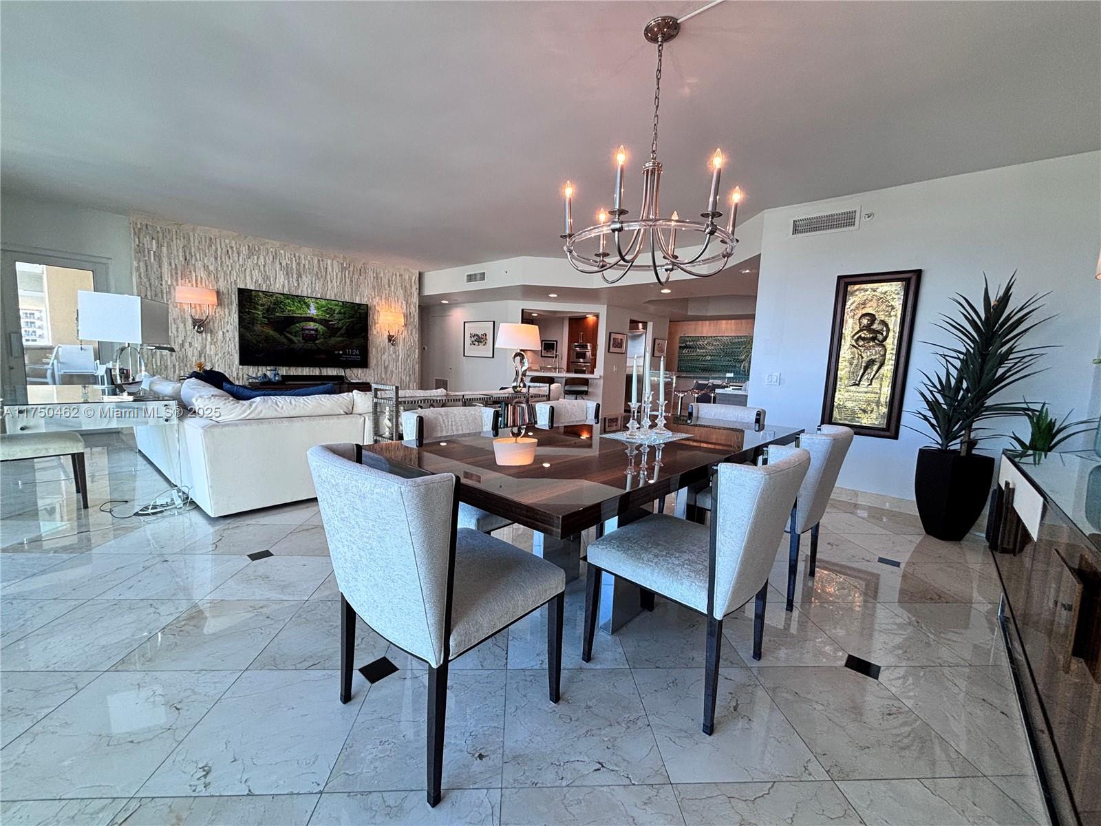 Location – Location!!! Le Club is a luxury boutique condominium of 66 units on the Intracoastal and only two blocks to the beach. DOCK SPACE AVAILABLE!!! Views of the ocean, Intracoastal waterway, and Birch State Park. Elevator opens to private foyer. Great Room with arched windows, dining area, natural stone covered accent wall, and acrylic "floating" bar with built-in storage. Gourmet kitchen with Euro cabinetry, 48" refrigerator, stainless steel back-splash, new quartz counter top, glass cook-top, and single large sink. Both the Primary and Secondary suites have hardwood floors, crown molding, walk-in closets with custom cabinetry, and floor-to-ceiling sliding doors. Primary has "His & Hers" marble shower with Jacuzzi tub and a bidet while the secondary has a marble walk-in shower.