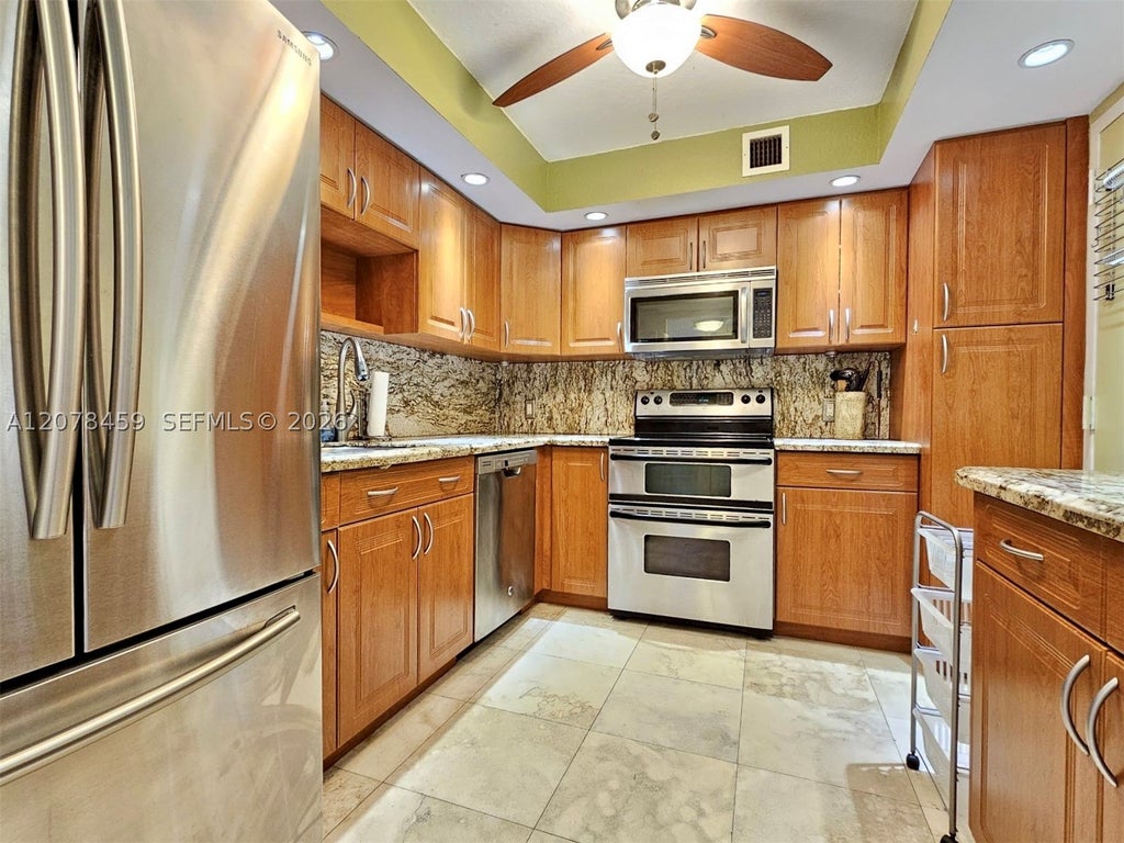 Photo of 427 Golden Isles Dr #16E, Hallandale Beach, FL 33009 (MLS # A12078459)