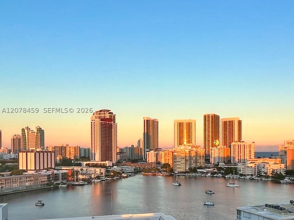 Photo of 427 Golden Isles Dr #16E, Hallandale Beach, FL 33009 (MLS # A12078459)