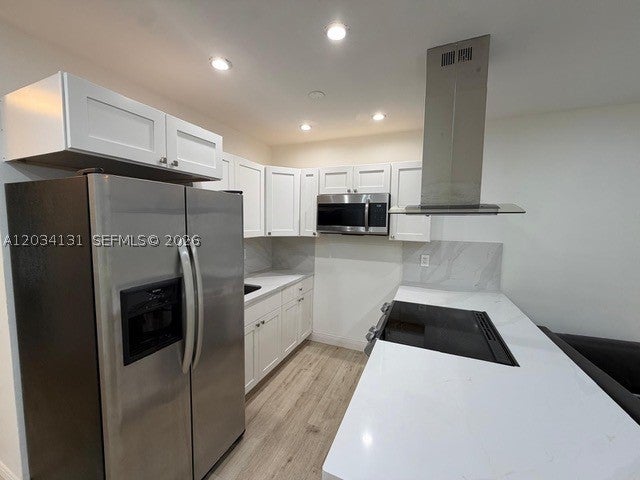 Photo of 500 Layne Blvd #19, Hallandale Beach, FL 33009 (MLS # A12034131)