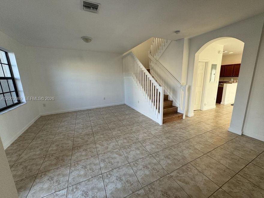 Spacious  and bright  highly desirable 3/2.1 Townhome at Martinique At Oasis community a great place to live, first level entry w- huge living room, a plus lake view, two parking spaces per unit with Guest parking in the complex. The complex amenities are wonderful like Pool, Gym, kids play area and much more